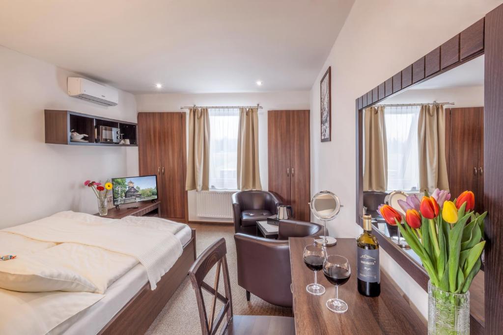 Telewizja i/lub zestaw kina domowego w obiekcie Hotel Kolonie