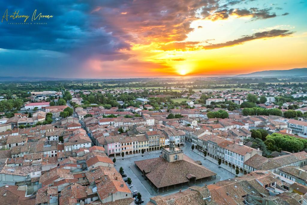an aerial view of a city at sunset at Chez Simon, au fil de l'eau in Revel