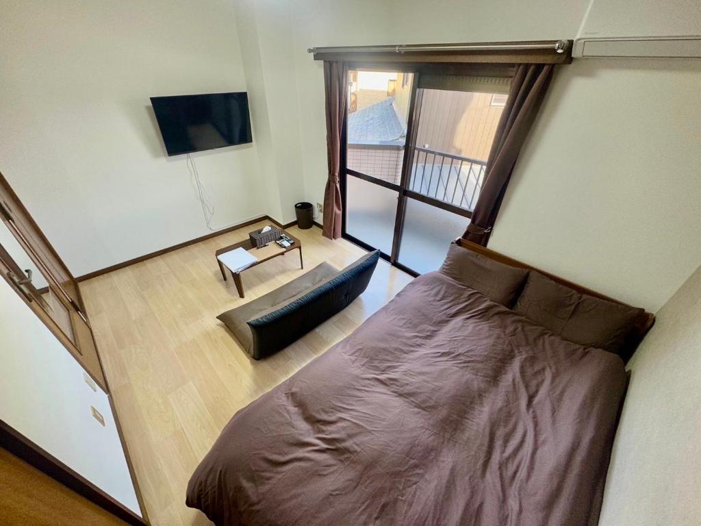 TV a/nebo společenská místnost v ubytování Apartment Hotel Kuki