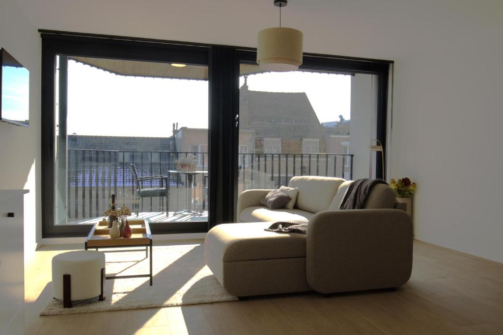 Posezení v ubytování Sealor, zonnig appartement met ruim terras
