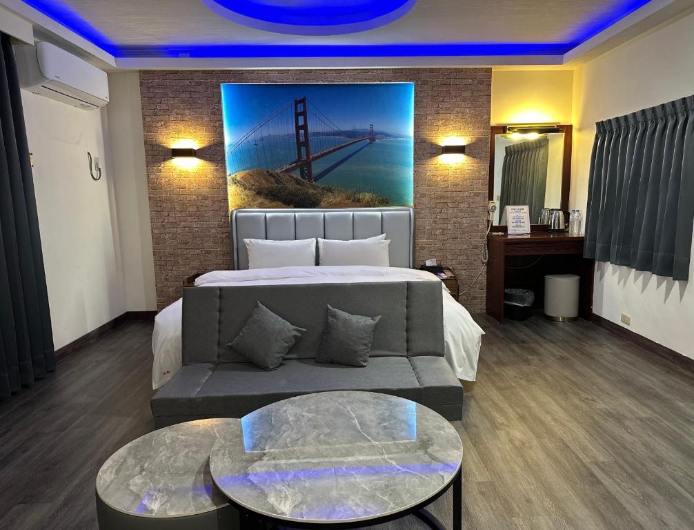 Postel nebo postele na pokoji v ubytování Hua Du Motel