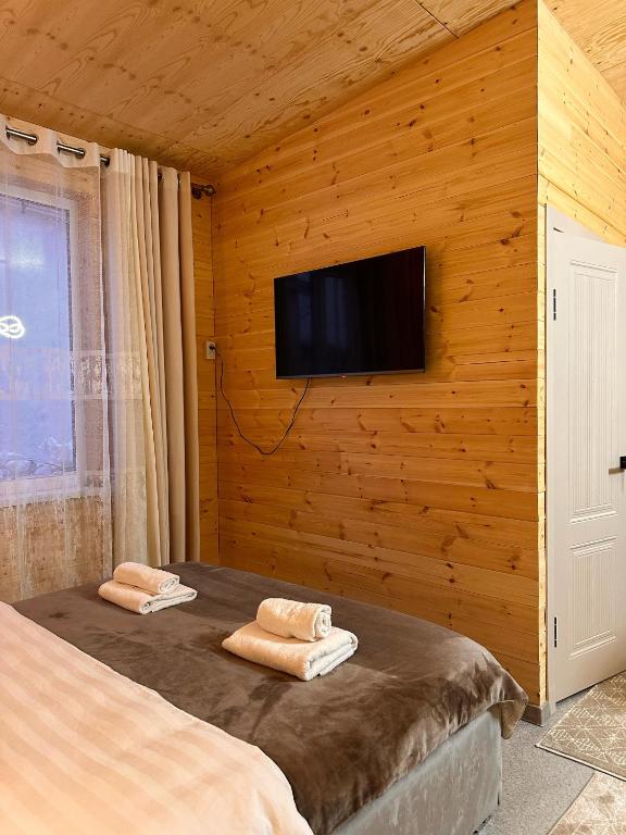 Postel nebo postele na pokoji v ubytování Vavilon