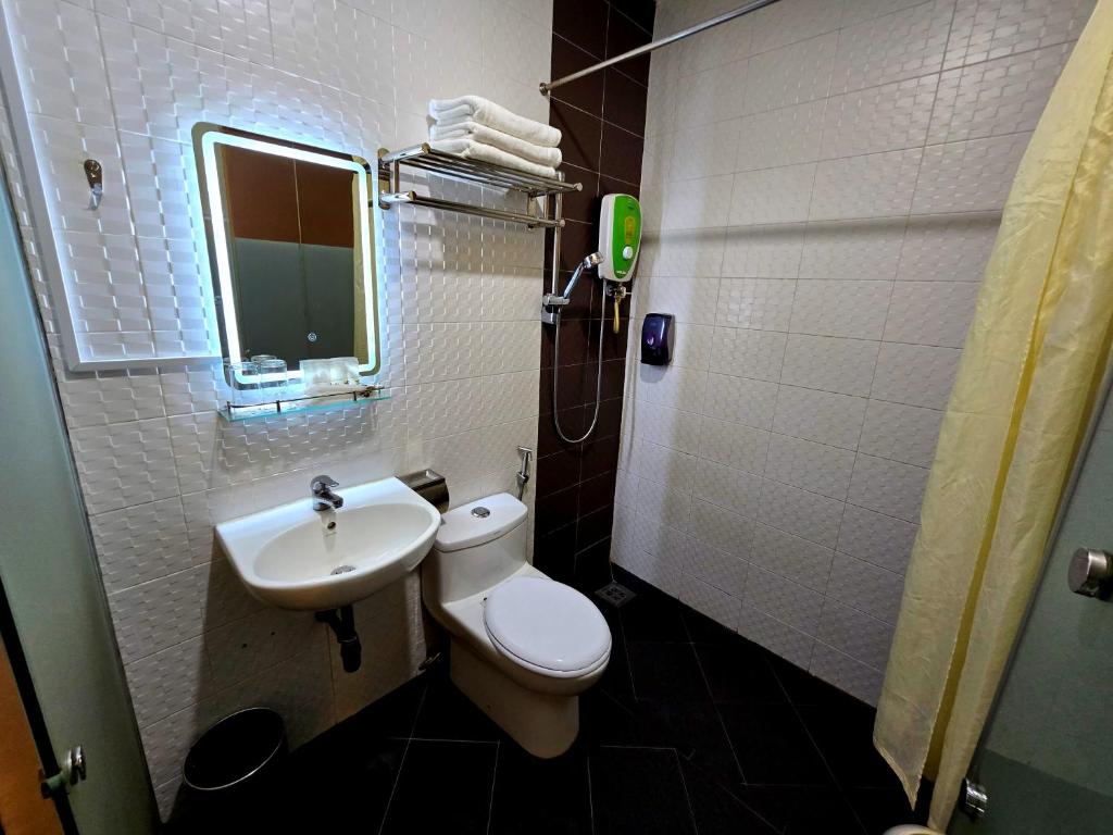 Koupelna v ubytování Eight Days Boutique Hotel - Permas Jaya