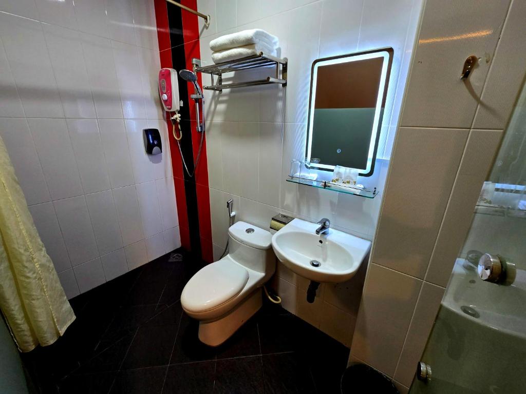 Koupelna v ubytování Eight Days Boutique Hotel - Permas Jaya