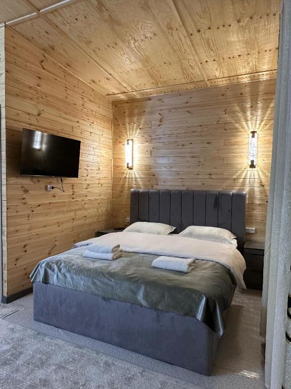 Postel nebo postele na pokoji v ubytování Vavilon