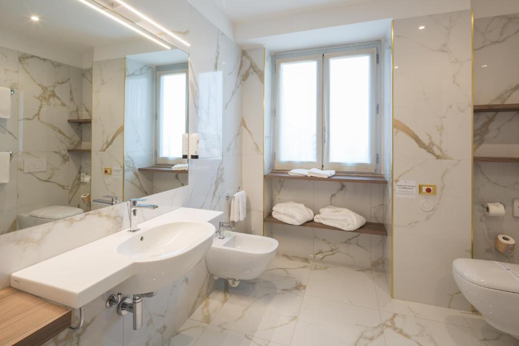 Koupelna v ubytování Hotel Nasco