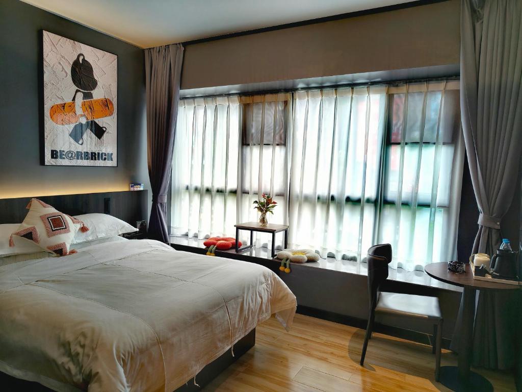 Postel nebo postele na pokoji v ubytování Andy International Hotel Shenzhen University Nanshan Metro Branch