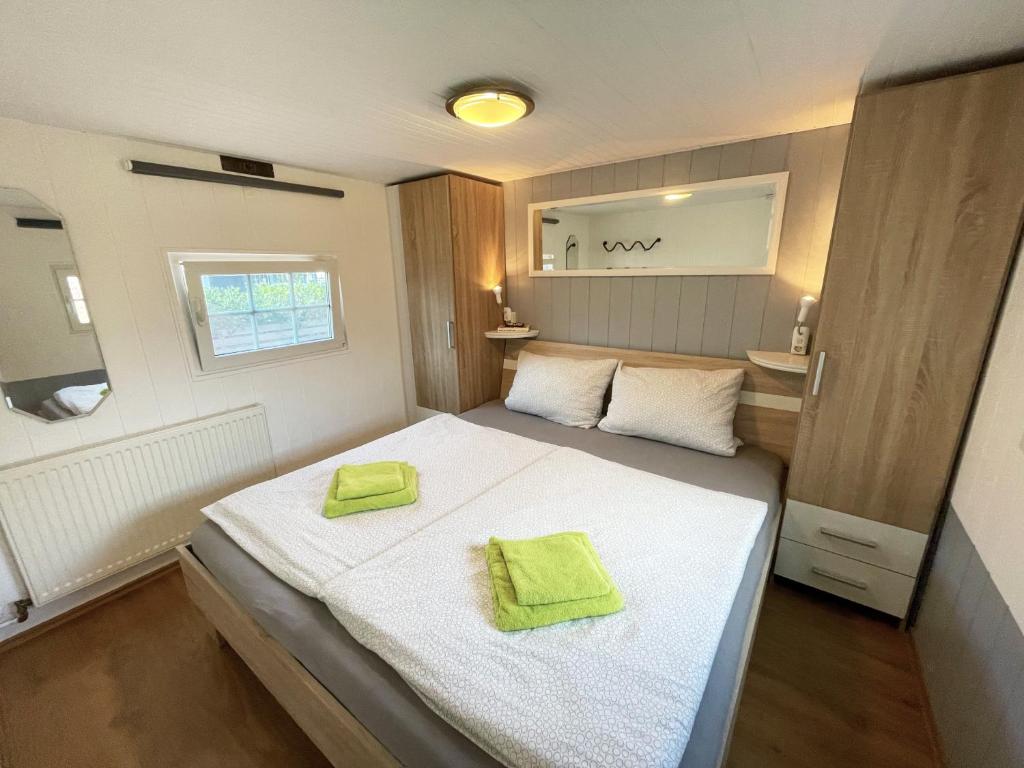 Ένα ή περισσότερα κρεβάτια σε δωμάτιο στο Ferienhaus Jonny