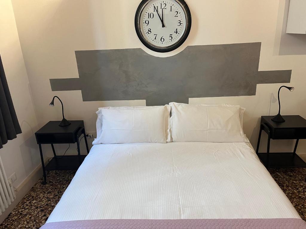 Posteľ alebo postele v izbe v ubytovaní Residenza Pedrotti