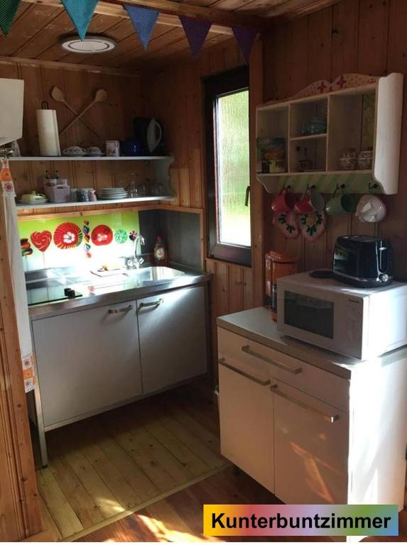Kuchyň nebo kuchyňský kout v ubytování Waldnest Odenwald - Waldhauszimmer