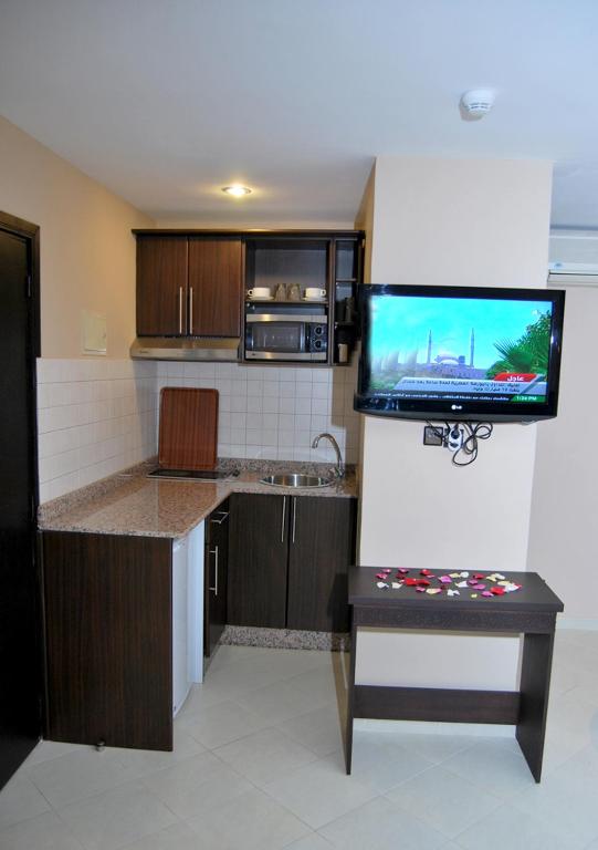 Kuchyň nebo kuchyňský kout v ubytování Suite Hotel Tilila