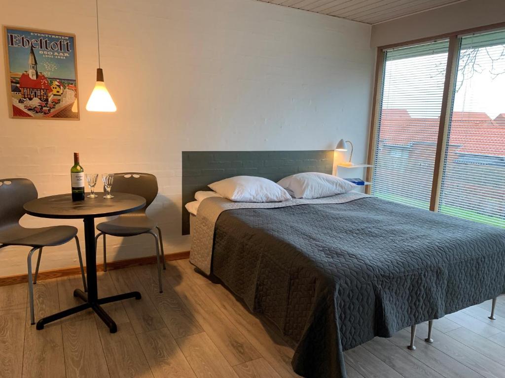Postel nebo postele na pokoji v ubytování Skansebakken 15