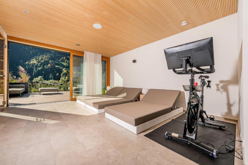 Fitness centrum a/nebo fitness zařízení v ubytování Luxus Chalet Skilift fußläufig Bergblick & Wellness