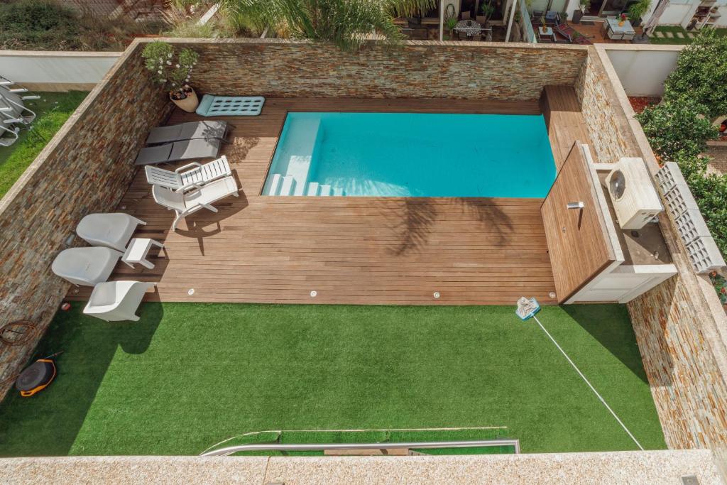 Swimmingpoolen hos eller tæt på Pool & Cinema Villa by Vacationy