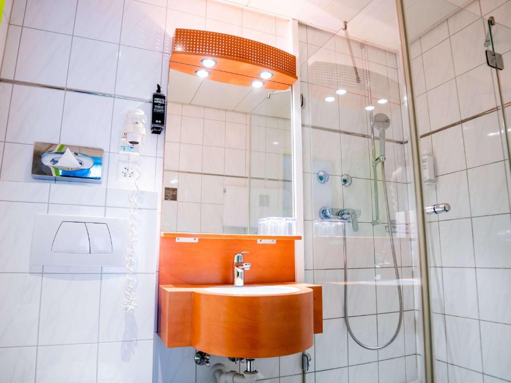 Koupelna v ubytování ibis Styles Luzern