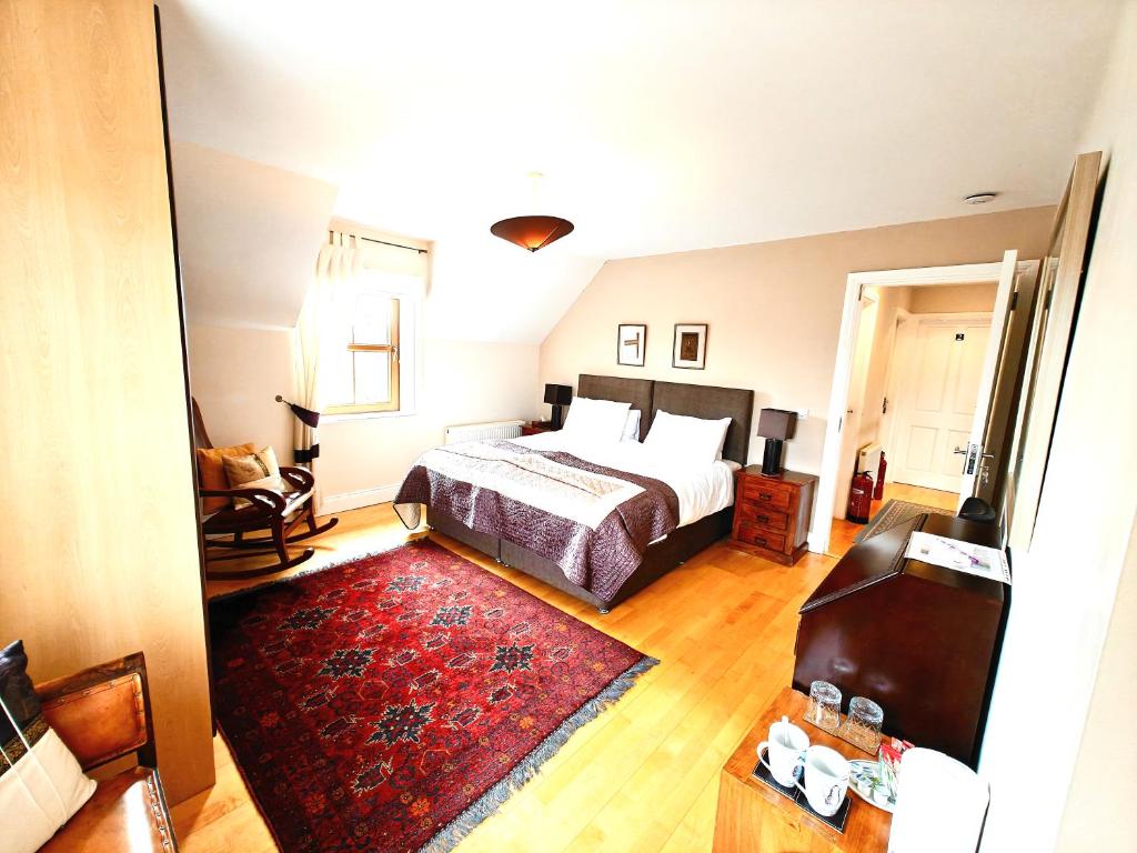 Postel nebo postele na pokoji v ubytování Álaind Lodges, Sneem