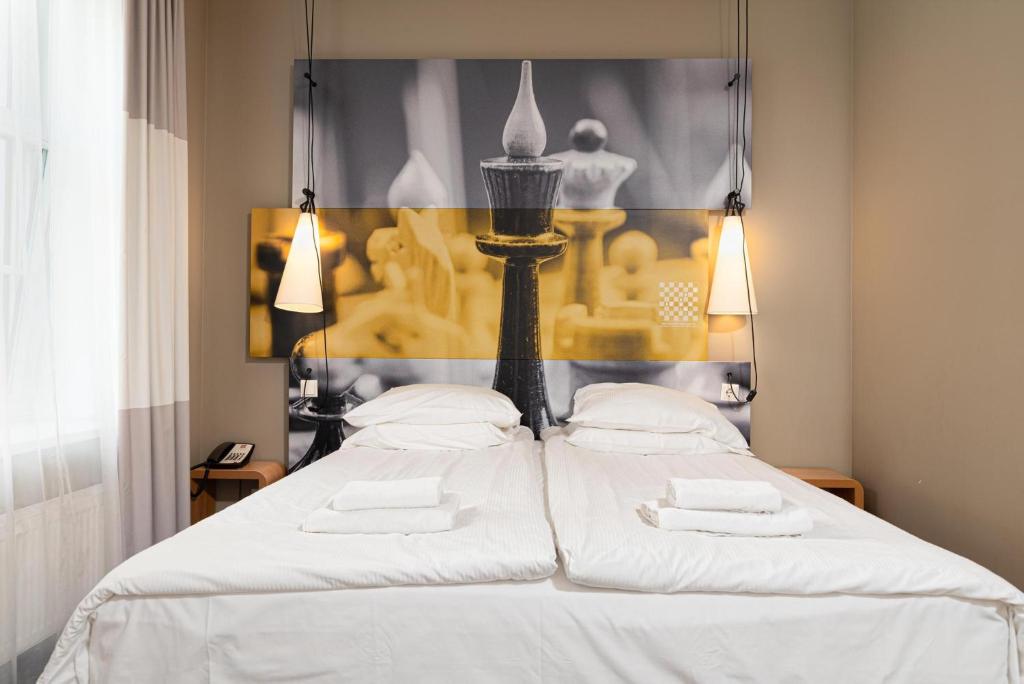 Postel nebo postele na pokoji v ubytování Ibis Riga Centre