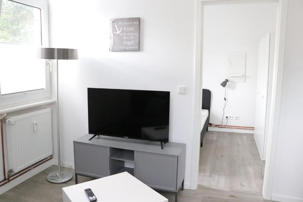 TV a/nebo společenská místnost v ubytování Schlafkonzept Hannover