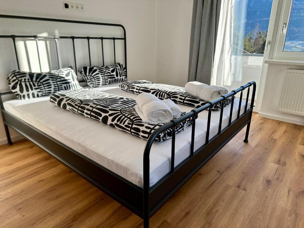 Postel nebo postele na pokoji v ubytování Apart Alm