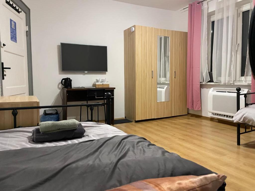 Postel nebo postele na pokoji v ubytování Pokoje w Gołdapi