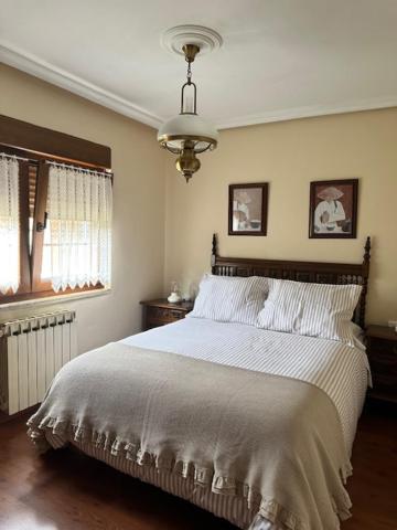 Ένα ή περισσότερα κρεβάτια σε δωμάτιο στο Casa Las Coberazas