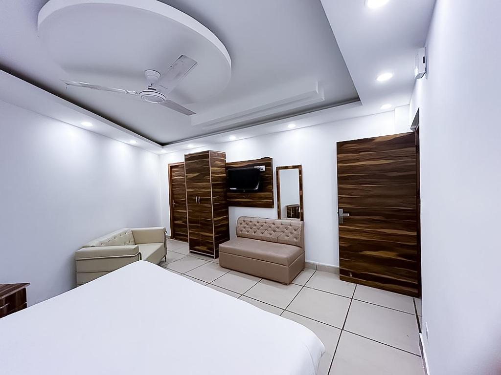 Postel nebo postele na pokoji v ubytování Hotel J Garden - Near Sec 137 Metro