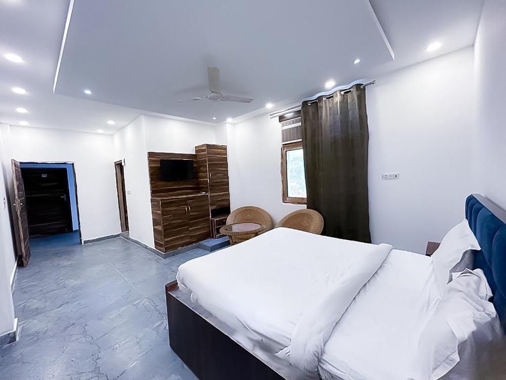 Postel nebo postele na pokoji v ubytování Hotel J Garden - Near Sec 137 Metro