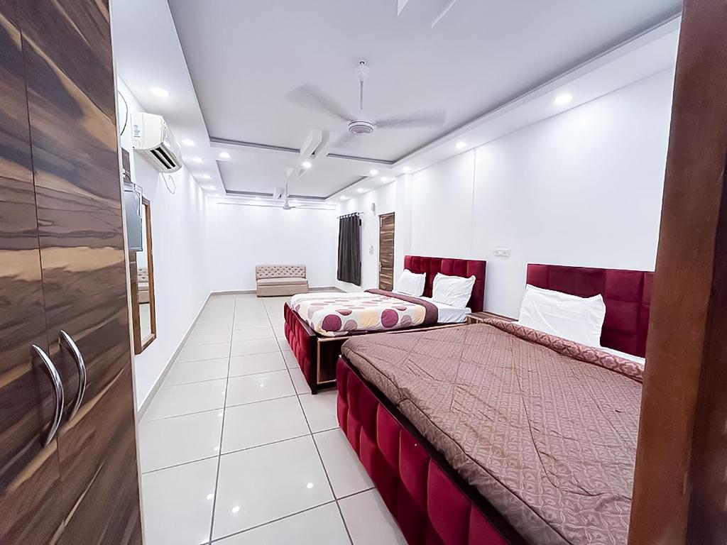 Postel nebo postele na pokoji v ubytování Hotel J Garden - Near Sec 137 Metro