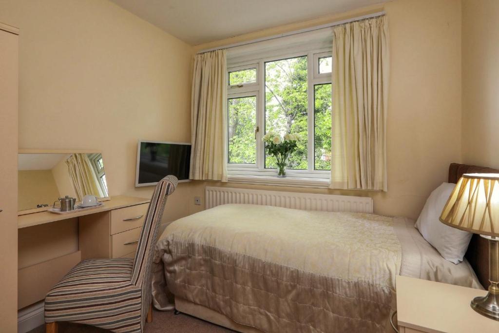 Postel nebo postele na pokoji v ubytování Westbourne Lodge Birmingham