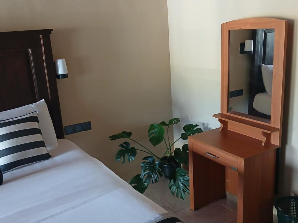 TV a/nebo společenská místnost v ubytování Green Peak - Mountain View Hotel & Restaurant