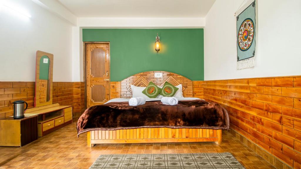 Postel nebo postele na pokoji v ubytování Dormigo
