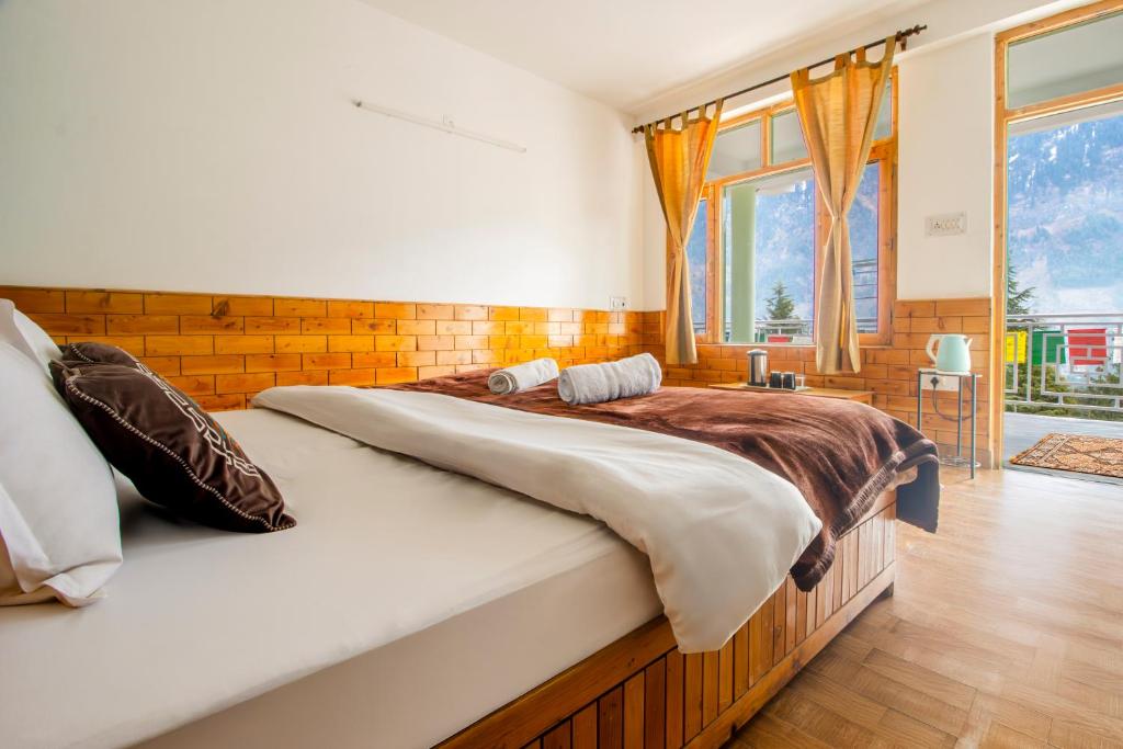 Postel nebo postele na pokoji v ubytování Dormigo