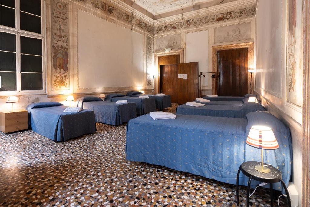 Postel nebo postele na pokoji v ubytování Foresteria Valdese Venezia