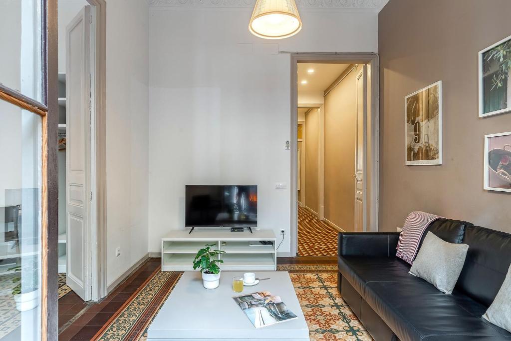 TV a/nebo společenská místnost v ubytování AB Bailen Apartments