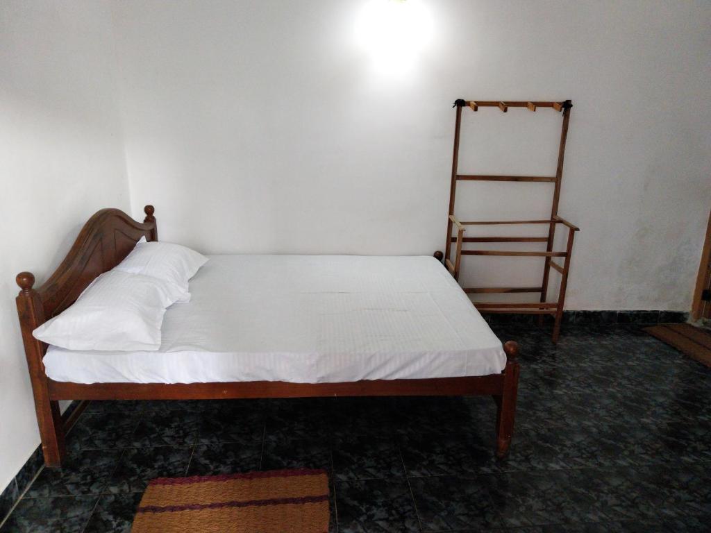 Postel nebo postele na pokoji v ubytování Inuli Coco Hut