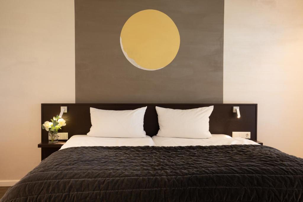 Postel nebo postele na pokoji v ubytování Hotel Vulcano Lindenhof