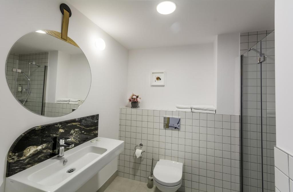 Koupelna v ubytování Antares Hotel