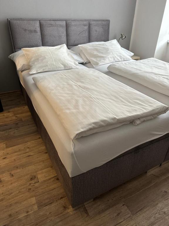 Posteľ alebo postele v izbe v ubytovaní Hotel Palác