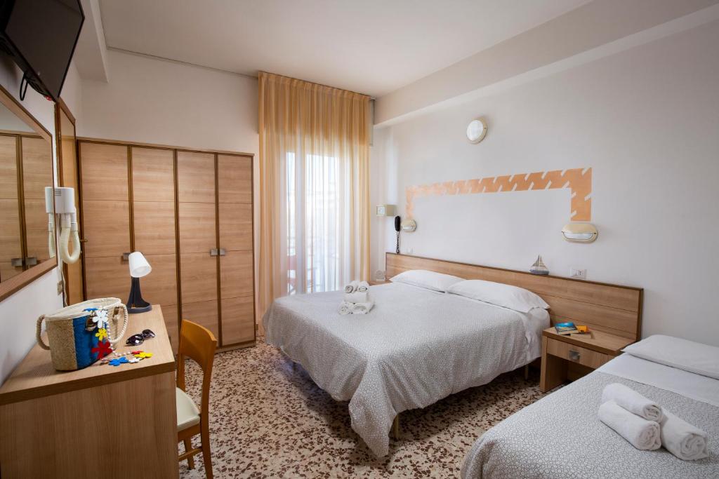 Postel nebo postele na pokoji v ubytování Hotel Ravello Adults Only