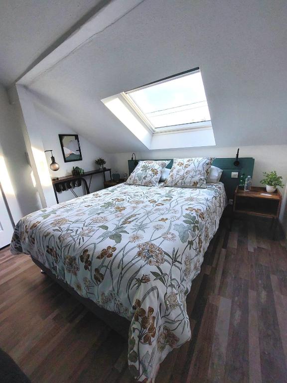 Letto o letti in una camera di Gite Au pommier fleuri et son "Appart" indépendant
