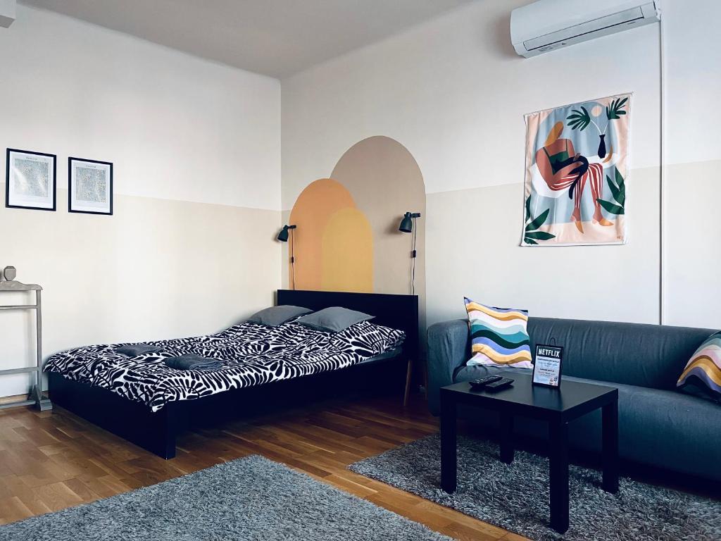 Posteľ alebo postele v izbe v ubytovaní Dorothy apartment near Budapest City Park