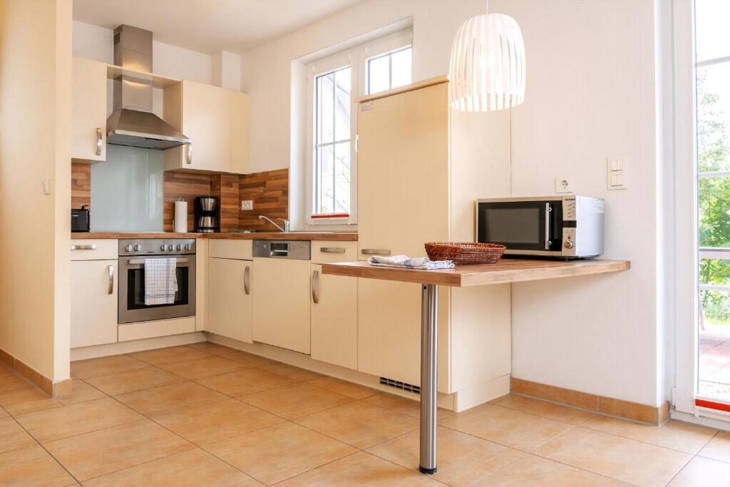 Kuchyň nebo kuchyňský kout v ubytování Ferien Im Reethaus Seepferdchen