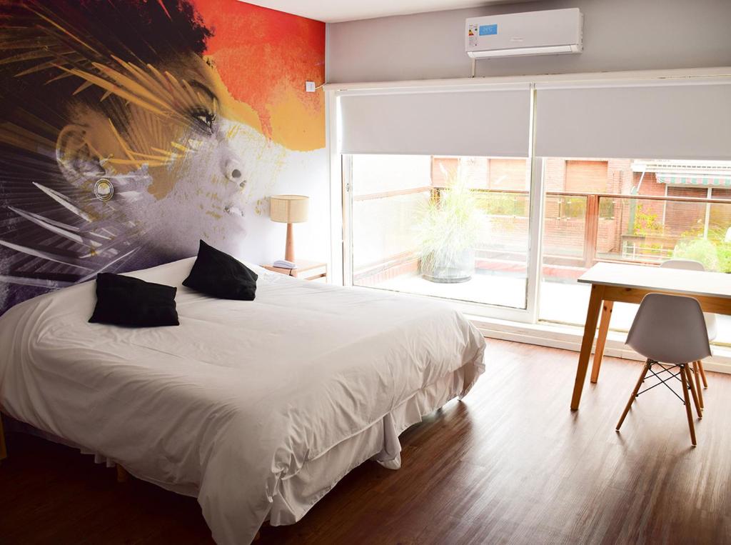 Una cama o camas en una habitación de Alquileres Temporarios by CLH Rentals