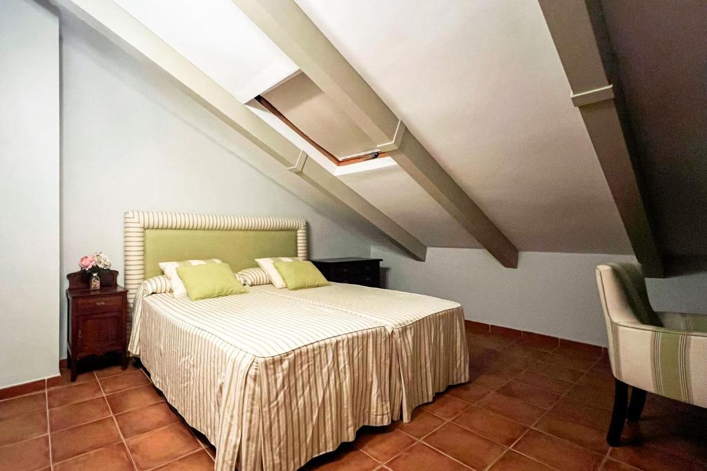 Posteľ alebo postele v izbe v ubytovaní Casa Patio de los Arcos