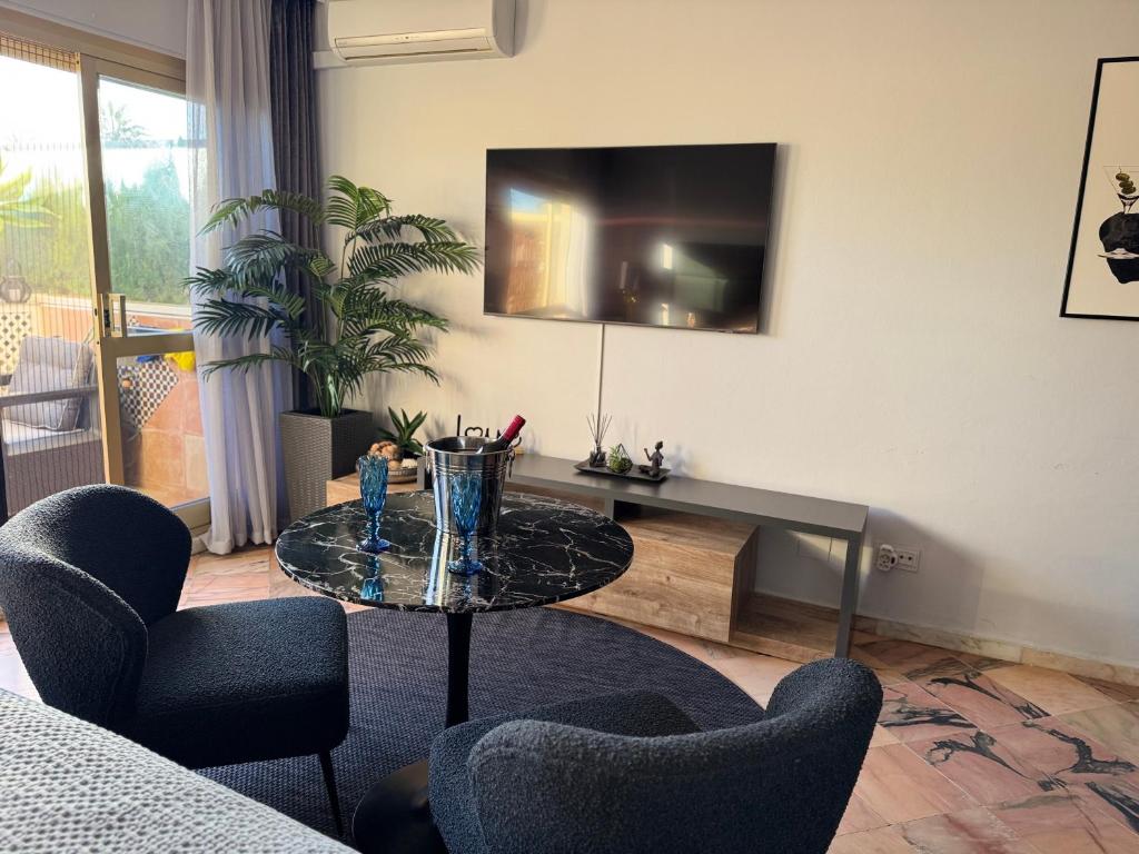 TV a/nebo společenská místnost v ubytování Super2beachfront