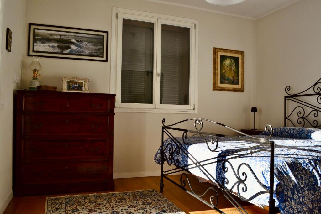 Postel nebo postele na pokoji v ubytování Pane e Marmellata