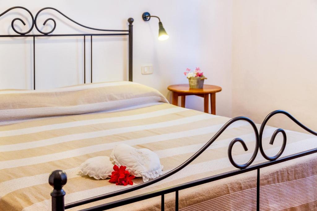 Letto o letti in una camera di Trilo Begonia