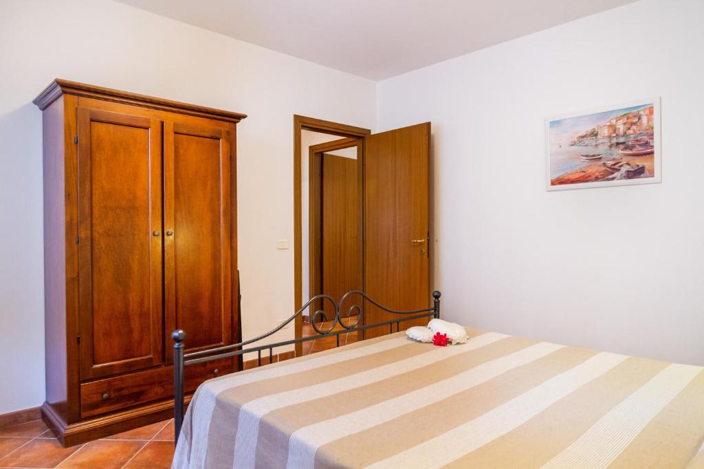 Letto o letti in una camera di Trilo Begonia