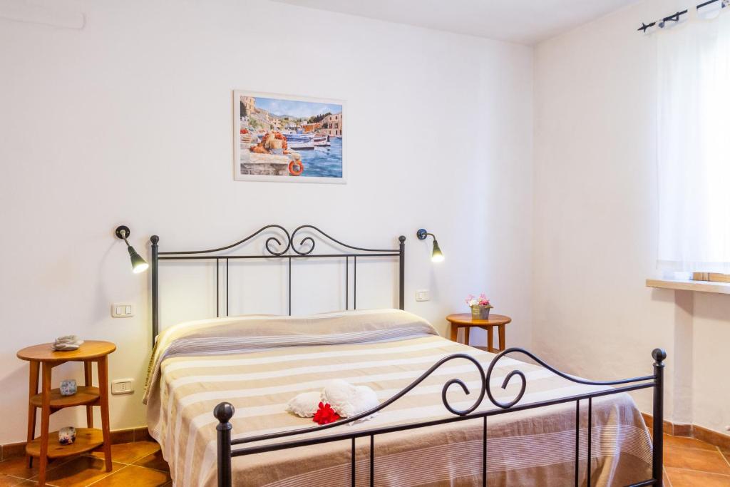 Letto o letti in una camera di Trilo Begonia