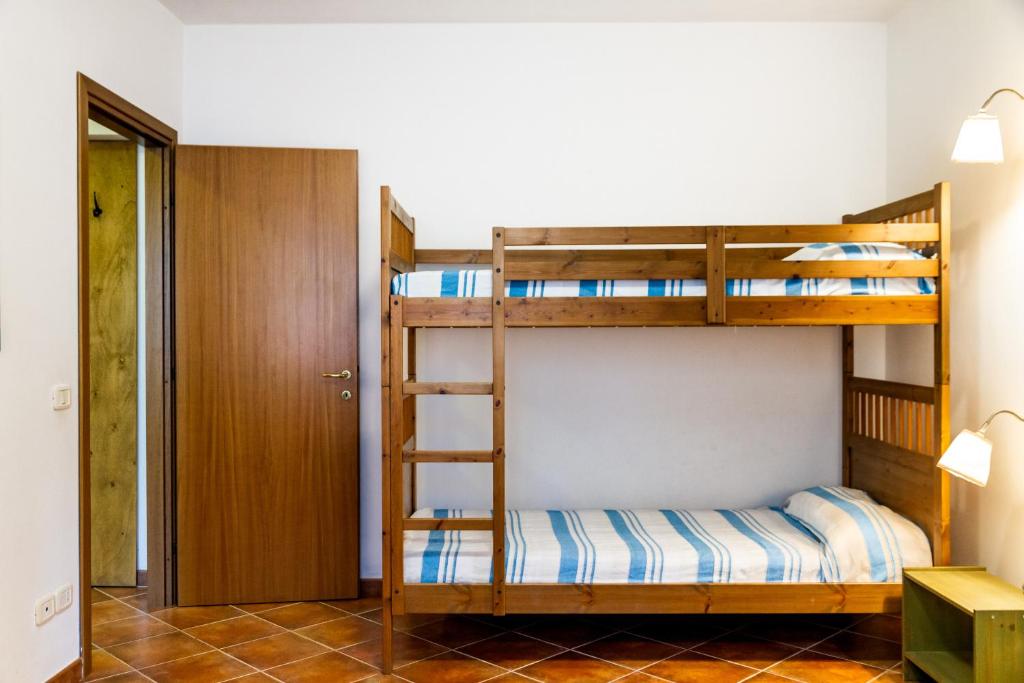 Postel nebo postele na pokoji v ubytování Bilo Erica